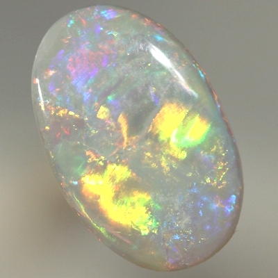 SOLID SEMI BLACK OPAL Bright rolling flashes, red, neon yellow and green